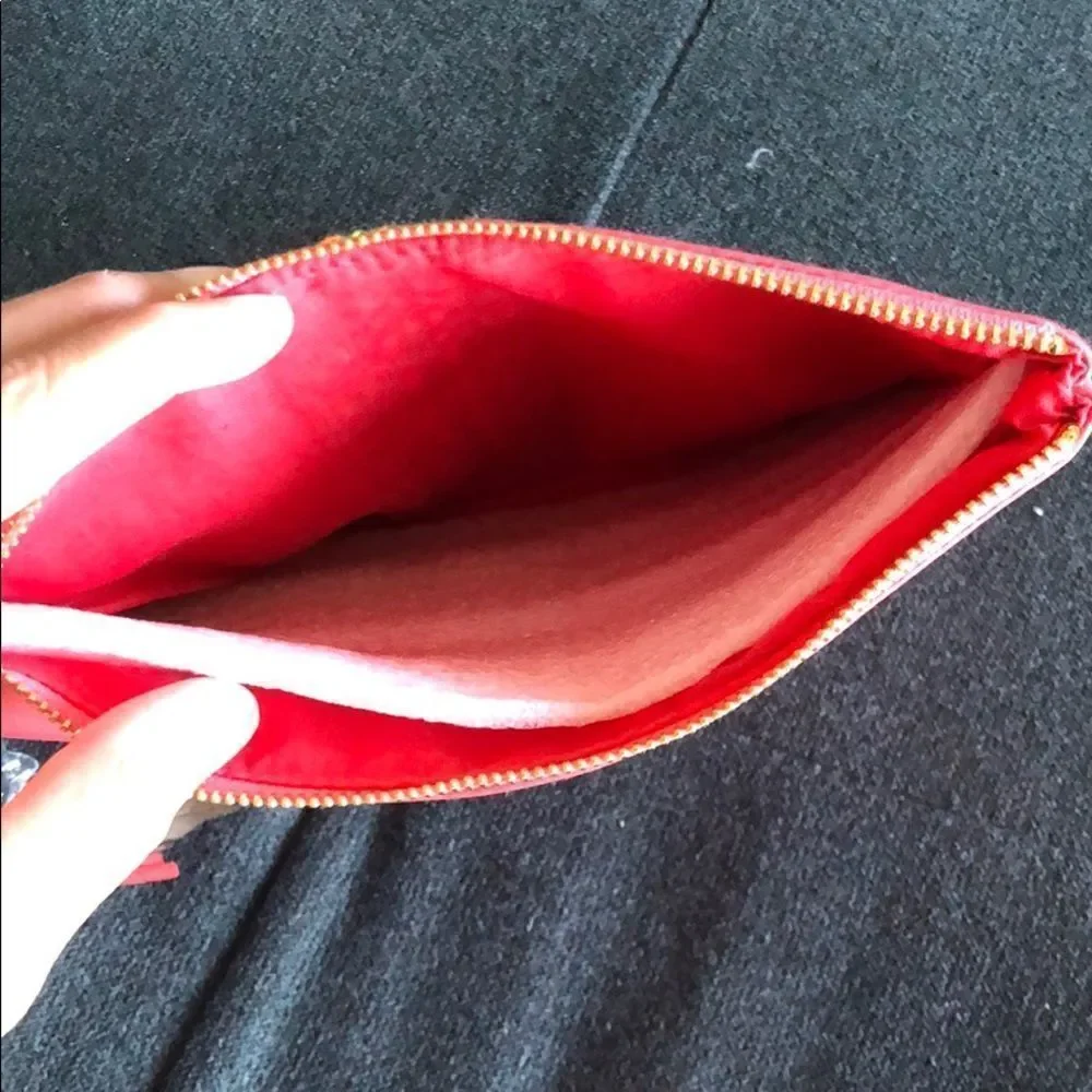 Kim and Zozi Pink Clutch Small Pen Stains on Back